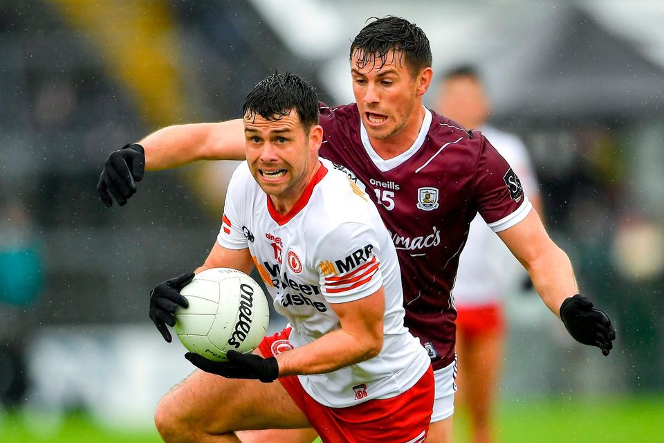 Darren McCurry of Tyrone in action against Shane Walsh of Galway over the weekend. Photo: Ray Ryan/Sportsfile