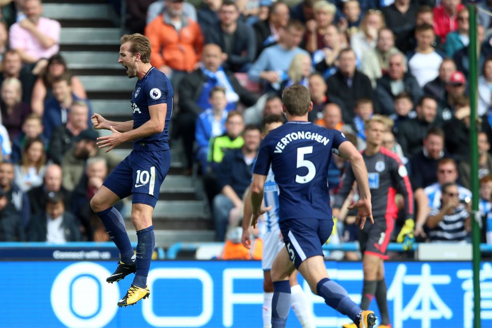 Tottenham Hotspur's Harry Kane celebrates scoring his side's third goal of the game during the Premier League match at the John Smith's Stadium, Huddersfield.