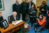 thumbnail: President Michael D Higgins and his wife Sabina signing the book of condolence for the late Fidel Castro at the Cuban Embassy on Pearse St Dublin. Photo: Kyran O'Brien