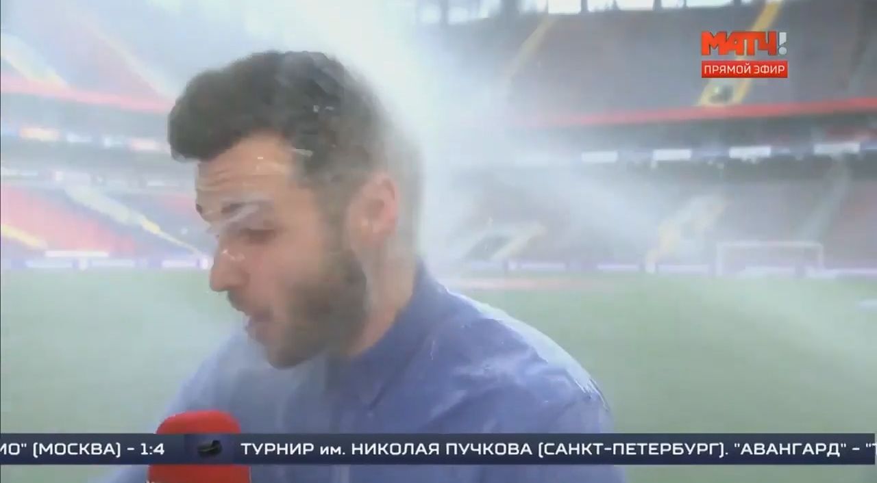 Russian TV presenter gets showered by sprinkler  If you thought you were  having a bad Tuesday, this may cheer you up. Russian football presenter  Evgeniy Evnevich was caught out by the