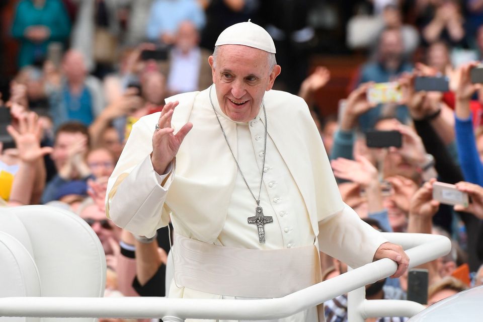 Pope Francis waves to the waiting crowds on College Green, Dublin. Photo: PA