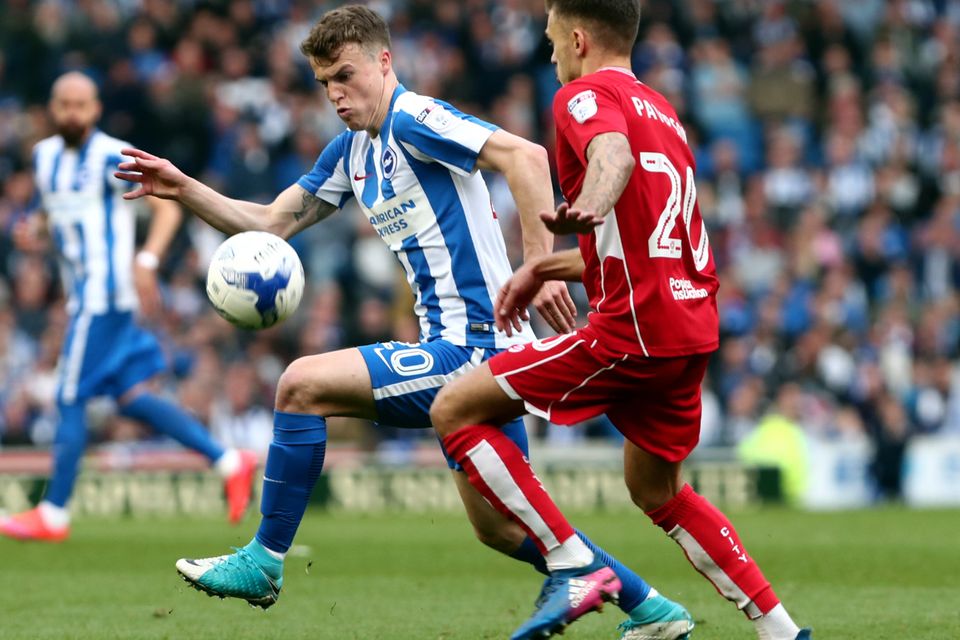 Brighton boss Chris Hughton has challenged Lewis Dunk and Solly March, pictured, to prove they deserve a place in Gareth Southgate's squad