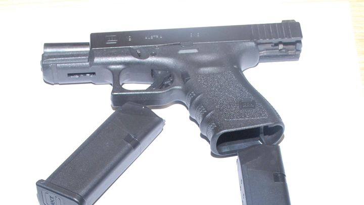 Man (30s) and woman (20s) arrested as gardai seize semi-automatic pistols, ammo and replica grenade