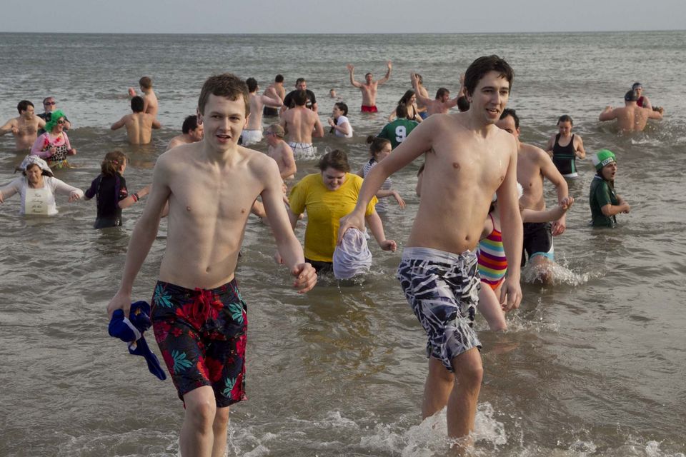 A young Simon Harris and his brother Adam during a New Year's Day swim in Bray. Photo: Michael Kelly