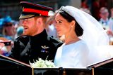 thumbnail: File photo dated 19/05/18 of Meghan Markle and Prince Harry leaving St George's Chapel at Windsor Castle after their wedding. During their wedding ceremony