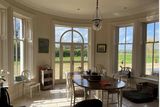 thumbnail: The dining room affords spectacular views over the surrounding countryside.