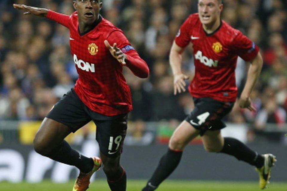 Manchester United's Danny Welbeck celebrates after scoring the opening goal during the Champions League round of 16 first leg soccer match between Real Madrid and Manchester United at the Santiago Bernabeu stadium in Madrid, Wednesday Feb. 13, 2013. (AP Photo/Andres Kudacki)