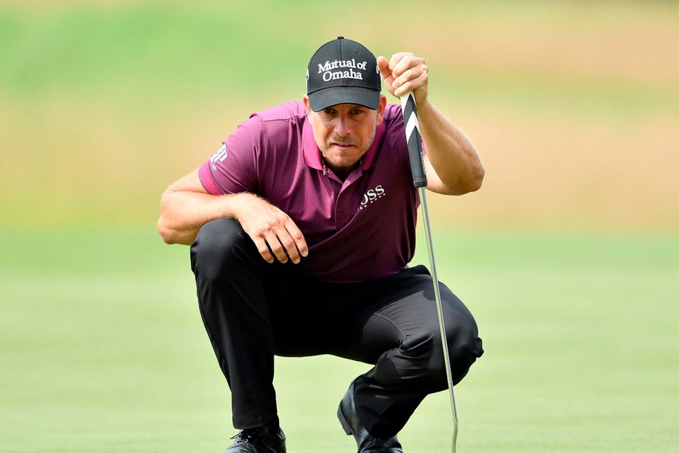 Henrik Stenson of Sweden lines up a putt during the second round of the BMW International Open