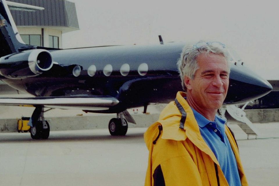 Jeffrey Epstein standing in front of one of his private planes. Photo: US Department of Justice