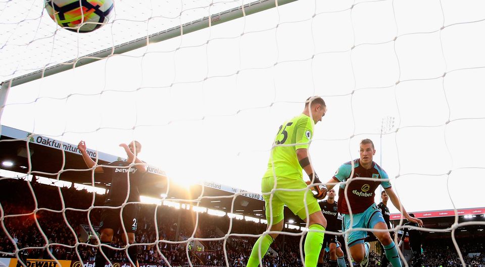 Chris Wood of Burnley celebrates scoring his sides goal as Joe Hart of West Ham United reacts. Photo: Getty Images