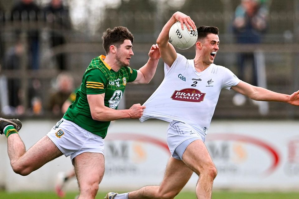26 March 2023; Mick O'Grady of Kildare is fouled by Diarmuid Moriarty of Meath during the Allianz Football League Division 2 match at St Conleth's Park in Newbridge, Kildare. Photo by Piaras Ó Mídheach/Sportsfile