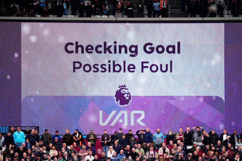 The big screen showing a VAR check for a foul on Arsenal goalkeeper David Raya in the build up to a disallowed goal from West Ham United's Callum Wilson. Photo credit: John Walton/PA Wire.