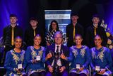 thumbnail: The Spa team of Liam Spillane, Garry O'Sullivan, Darragh Brosnan, Kianan O'Doherty, Anna O'Connor, Katie O'Connor, Meghann Cronin and Áine Brosnan, pictured with GAA President Jarlarth Burns, that won the Set Dancing competition at the All-Ireland Scór Sinsear finals at the INEC Arena in Killarney on Sunday. Photo by Sportsfile