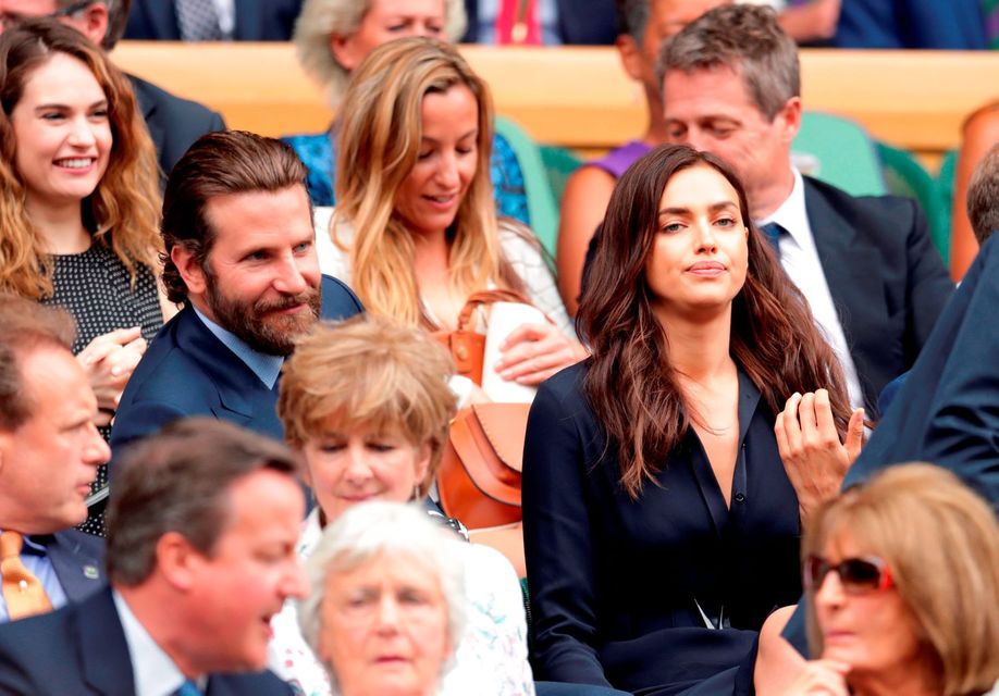 Bradley Cooper and Irina Shayk in the royal box on day thirteen of the Wimbledon Championships at the All England Lawn Tennis and Croquet Club, Wimbledon