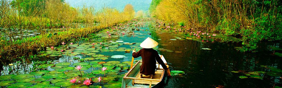 Rural Vietnam is blessed with lush jungle greenery and lotus flowers