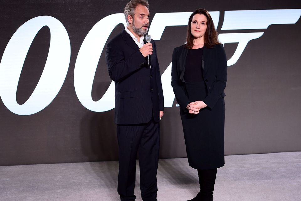 Director Sam Mendes and Barbara Broccoli at the reavealing of the new James Bond film at pinewood Studio in Buckinghamshire. PRESS ASSOCIATION Photo. Picture date: Thursday December 4, 2014. The new 24th James Bond movie, which begins photography next week, will be called Spectre