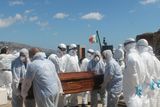 thumbnail: Crew Members of the LE Niamh carry remains from the vessel
Credit: Irish Defence Forces