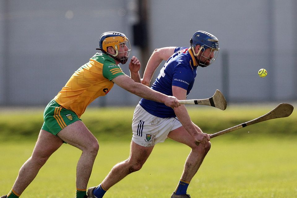 Wicklow's Gavin Weir is challenged by Donegal's Ciaran Bradley.