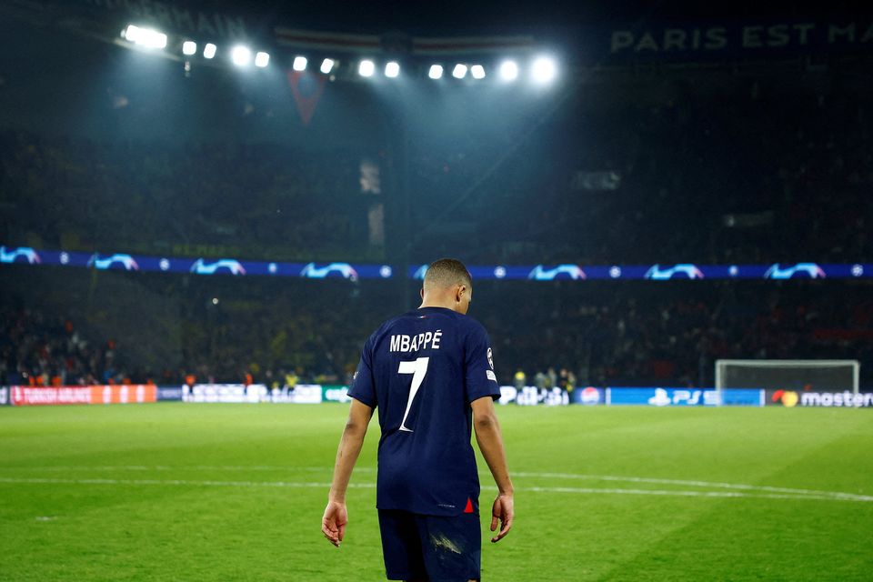 Paris St Germain's Kylian Mbappe leaves the pitch after the Champions League defeat by Borussia Dortmund. Photo: Reuters