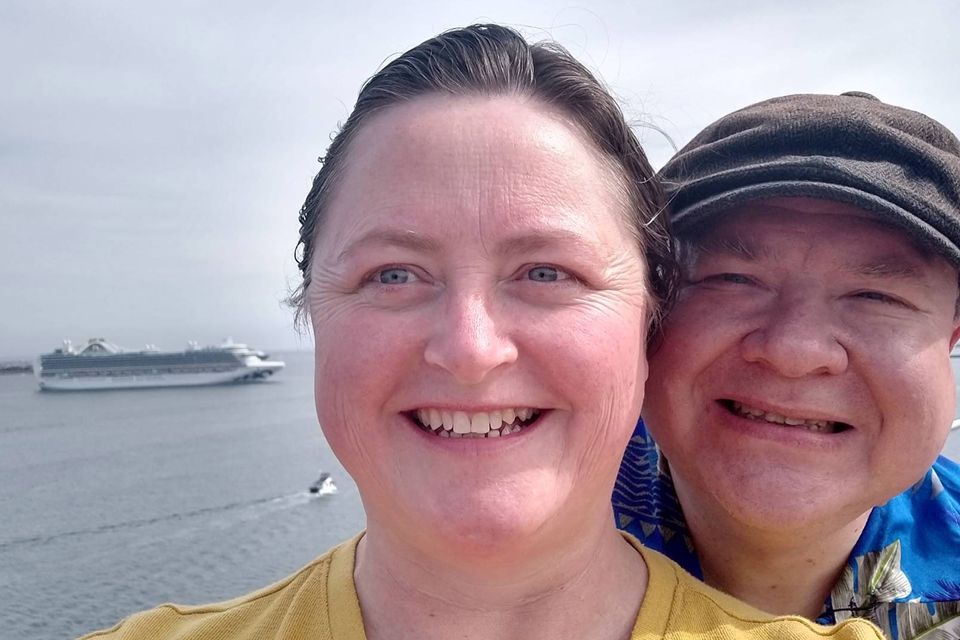 Husband and wife Angelyn and Richard Burk aboard a Carnival Cruise Line ship in March 2022. The couple has decided to spend their retirement on cruise ships. Pic: Family photo