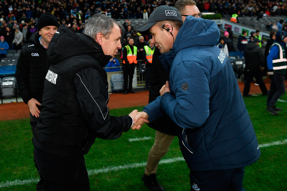 ALL SQUARE: Rival managers Peter Keane and Dessie Farrell shake hands after Saturday’s stalemate. Pic: Sportsfile