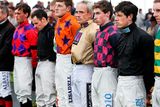 thumbnail: Jockeys including Ruby Walsh in the parade ring at the Galway Races observe a minutes silence for Jockey J T. McNamara who passed away. Photo: Steve Humphreys