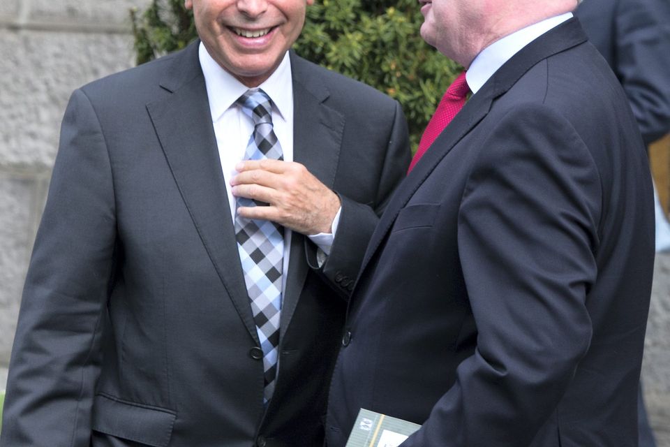 Former Minister for Justice Alan Shatter smiling with Tanaiste Eamon Gilmore at the annual 1916 Commemoration Ceremony in Arbour Hill today hours before his resignation. 
Pic:Mark Condren