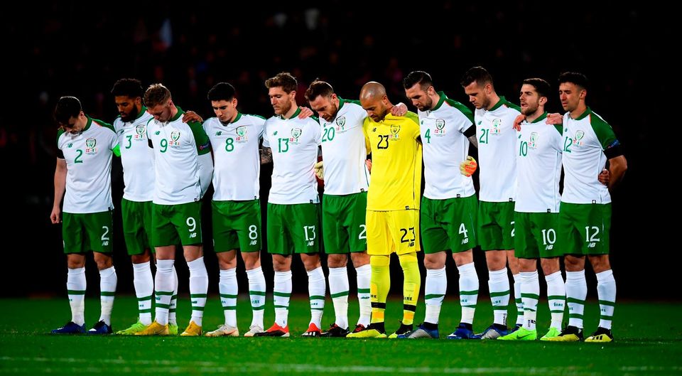 Silence: The Ireland team observe a minute’s silence prior to the match with Denmark as a mark of respect to David Clerkin. Photo: Stephen McCarthy/Sportsfile