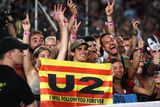 thumbnail: Fans go mad as U2 perform onstage on the first night of their 360 tour held at Camp Nou in Barcelona. Photo: Getty Images