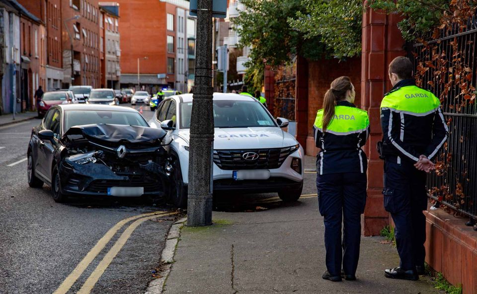 Gardai at the scene of an incident involving a Garda car in Dublin city centre on Friday. Photo: Damien Storan.