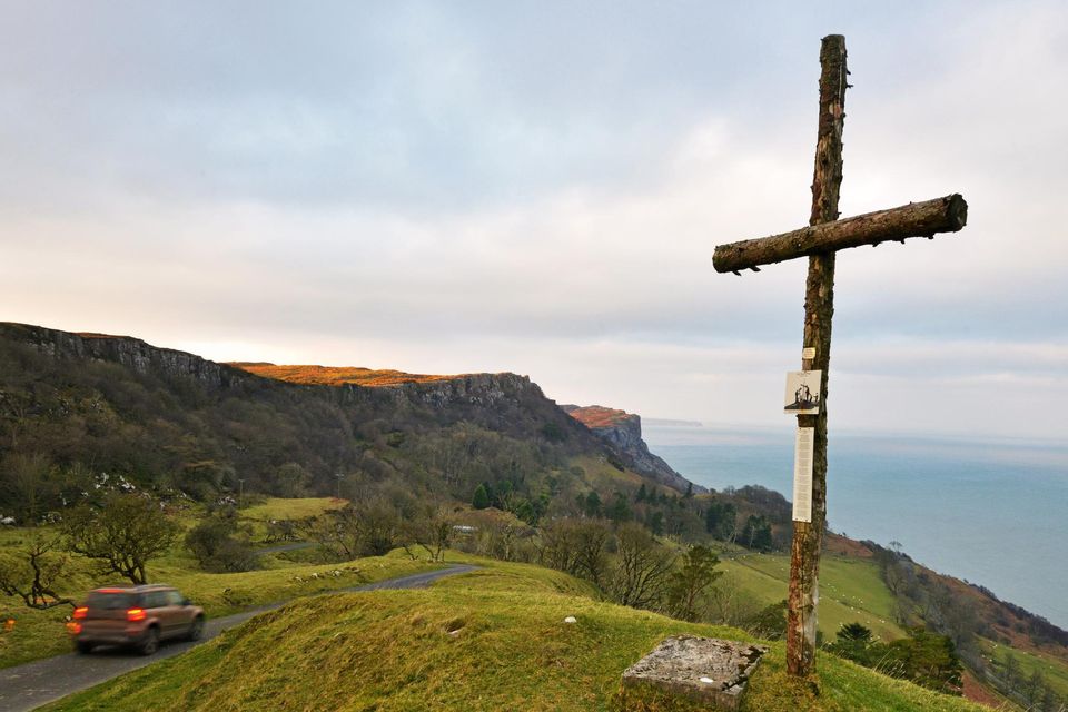A wooden cross before the descent to Murlough Bay, Co Antrim. Photo: Pól Ó Conghaile