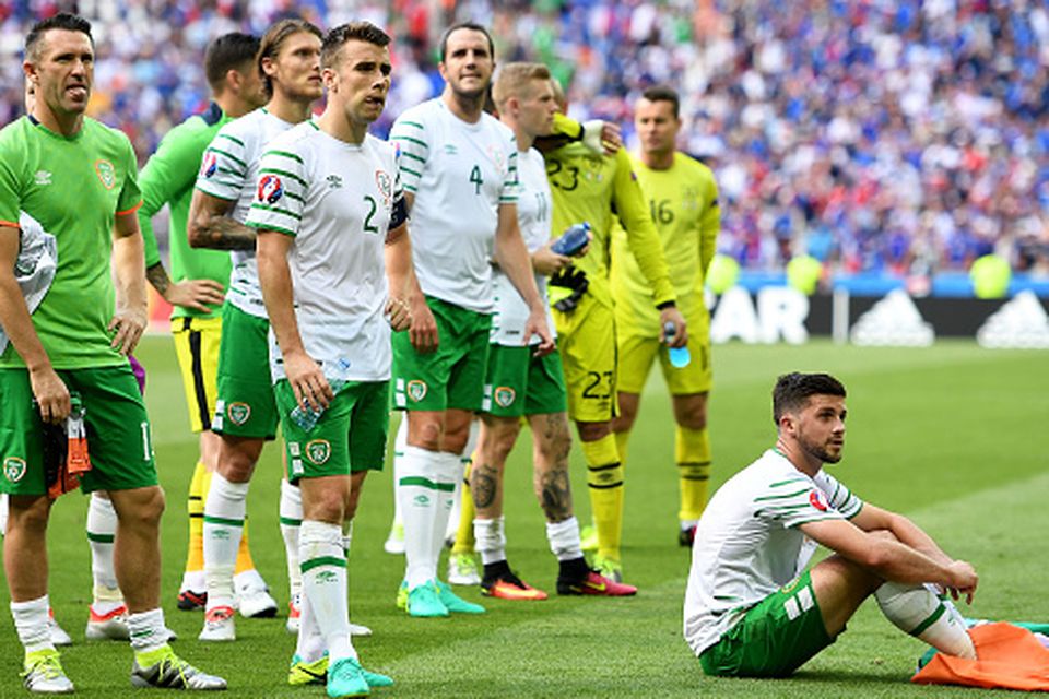 LYON, FRANCE - JUNE 26:  Dejected Republic of Ireland players are seen in front of their supporters after their team's 1-2 defeat in the UEFA EURO 2016 round of 16 match between France and Republic of Ireland at Stade des Lumieres on June 26, 2016 in Lyon, France.  (Photo by Laurence Griffiths/Getty Images)
