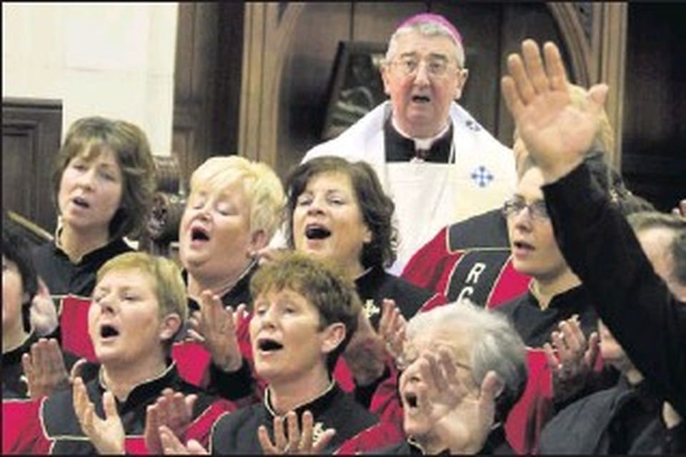 &#x25A0; Archbishop Diarmuid Martin with the Revival gospel choir in St. Saviours, Arklow at the Christian Unity Service.