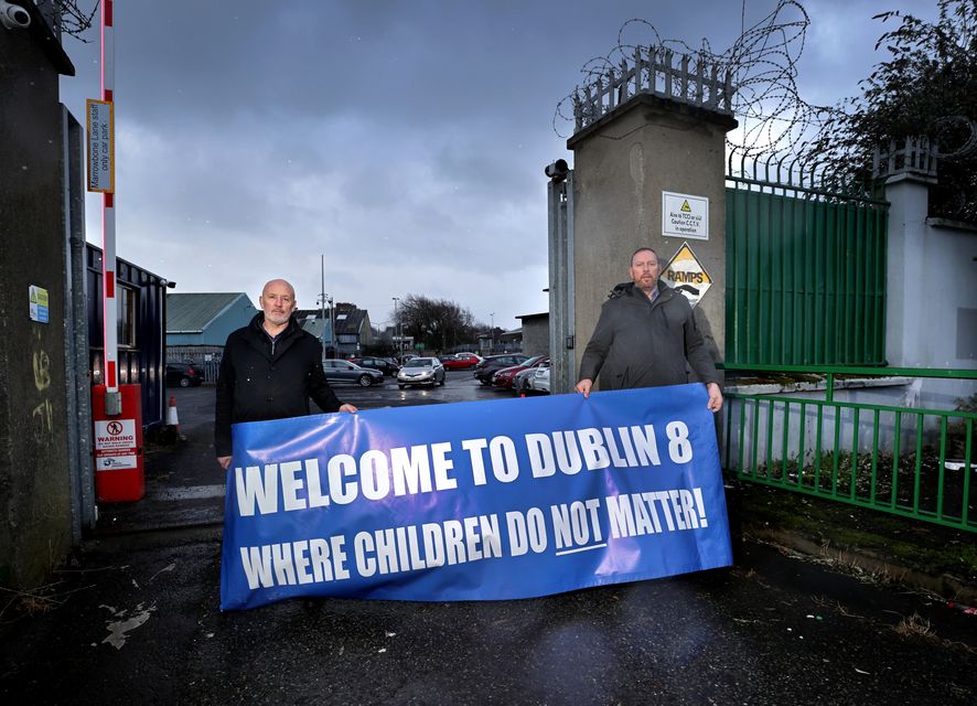 JJ O'Mahony, Chairperson of Sporting Liberties, and Tom Magee, President of Liberty Saint's Rugby Club, at the depot on Marrowbone Lane which they say could be used for sports facilities for local kids. Pic: Frank McGrath