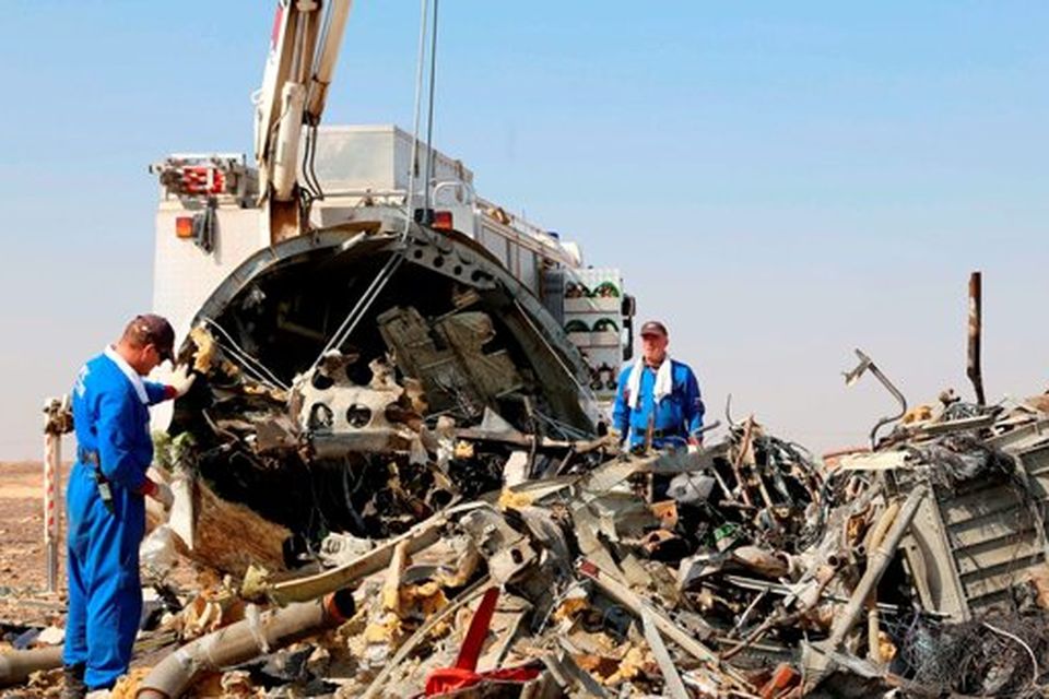 Russian emergency services personnel working at the crash site of a A321 Russian airliner in Wadi al-Zolomat