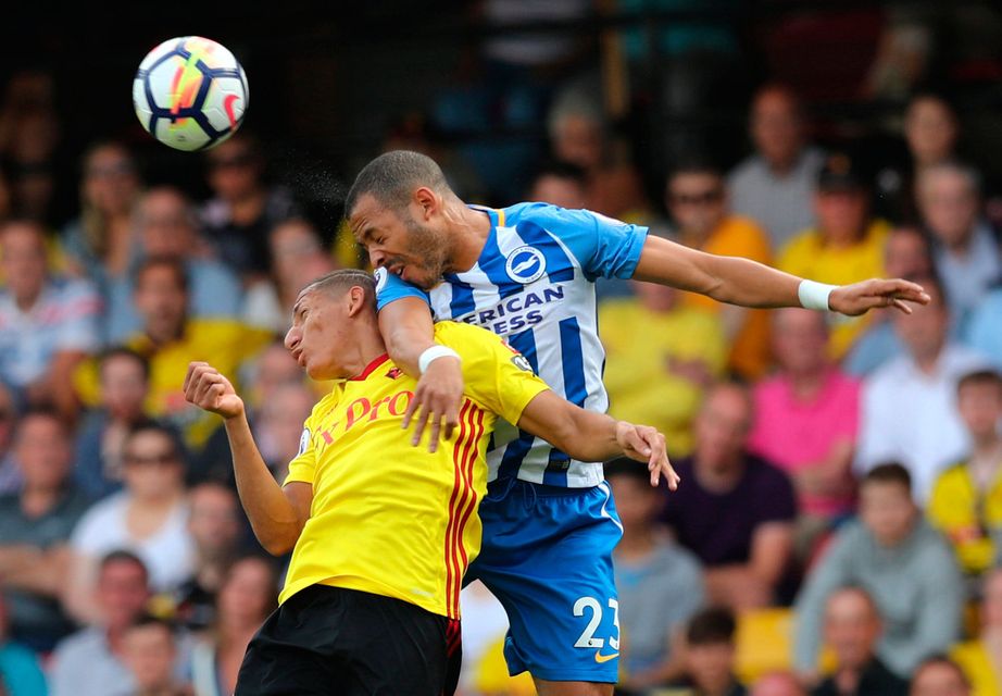 Watford's Richarlison battles for the ball with Brighton's Liam Rosenior Photo: REUTERS/Eddie Keogh