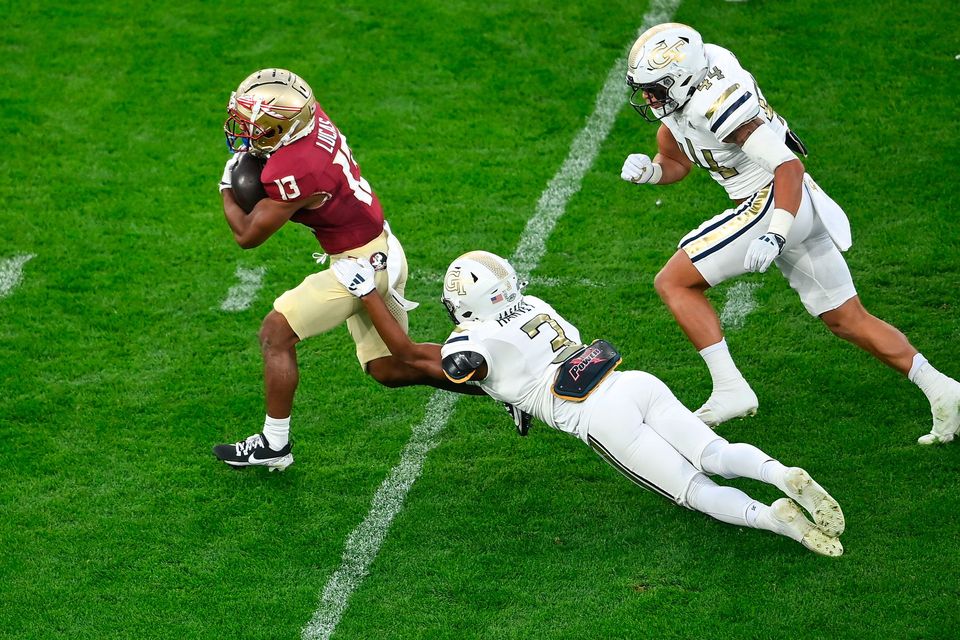 24 August 2024; Florida State Seminoles running back Jaylin Lucas in action against Georgia Tech Yellow Jackets defensive lineman Horace Lockett during the 2024 Aer Lingus College Football Classic match between Florida State and Georgia Tech at Aviva Stadium in Dublin. Photo by David Fitzgerald/Sportsfile 