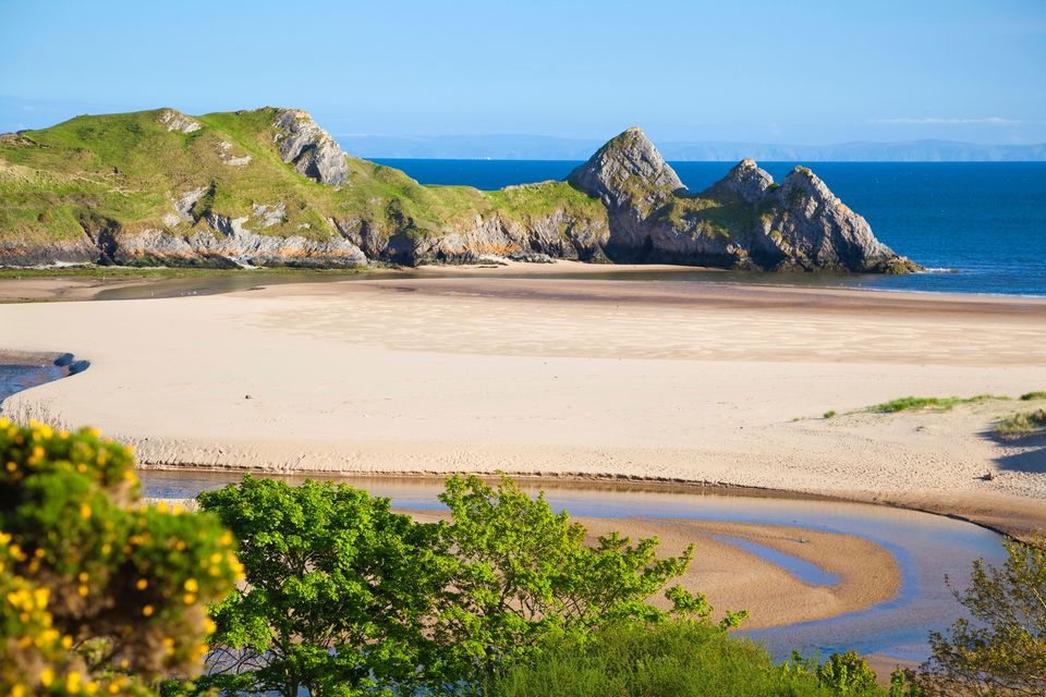 Bahía de Three Cliffs en Gower, Gales. Alamy/PA