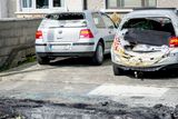 thumbnail: The back of the car melted after the bomb went off in the Lough Conn Avenue estate. Photo: Douglas O'Connor/www.doug.ie