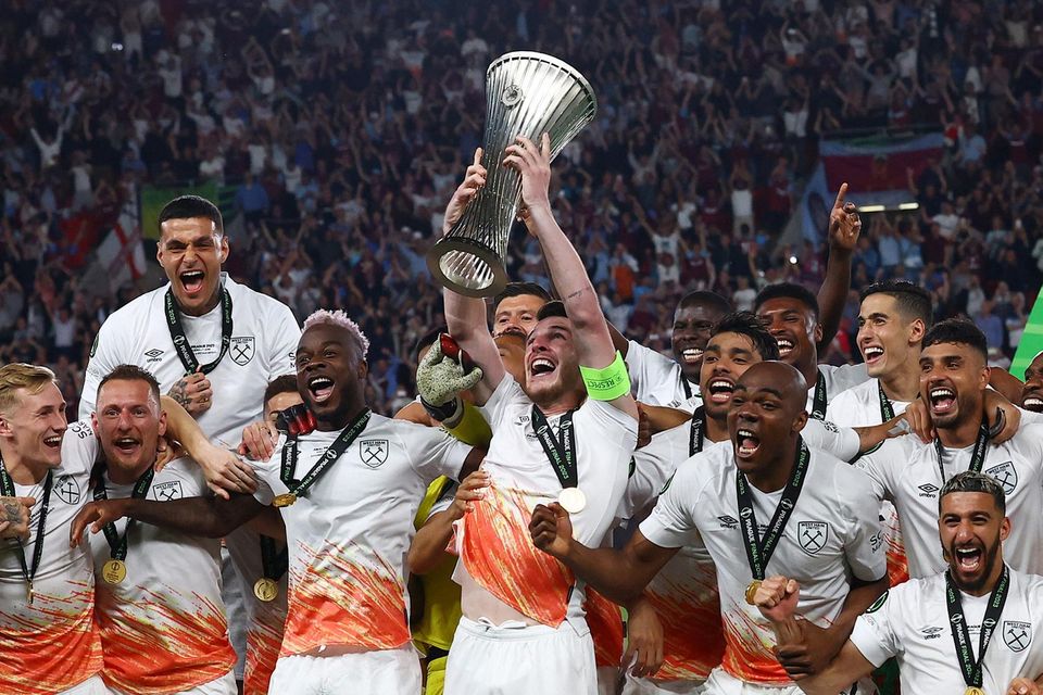 West Ham United's Declan Rice and teammates celebrate with the trophy after winning the Europa Conference League