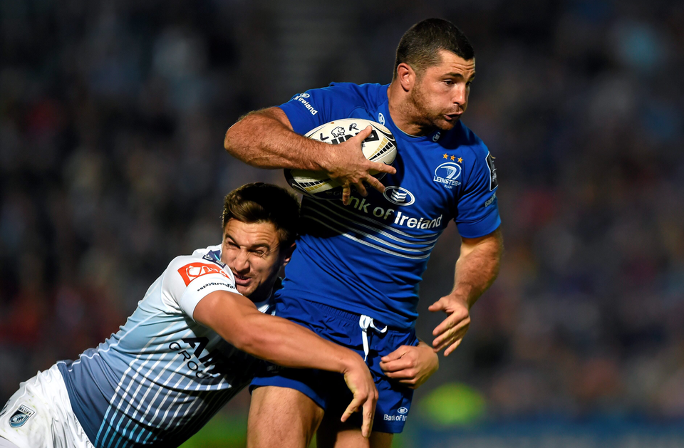 Leinster's Rob Kearney is tackled by George Watkins of the Cardiff Blues during the Guinness PRO12 at the RDS.