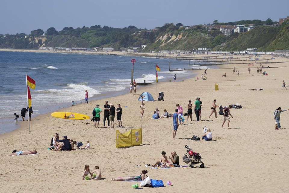 Police attended the beach off Bournemouth Pier (PA)