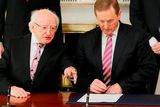 thumbnail: Taoiseach Enda Kenny and President Michael D Higgins sign an order dissolving the Irish Parliament and starting the 2016 general election campaign at Aras an Uachtarain in Dublin. Photo: Niall Carson/PA Wire
