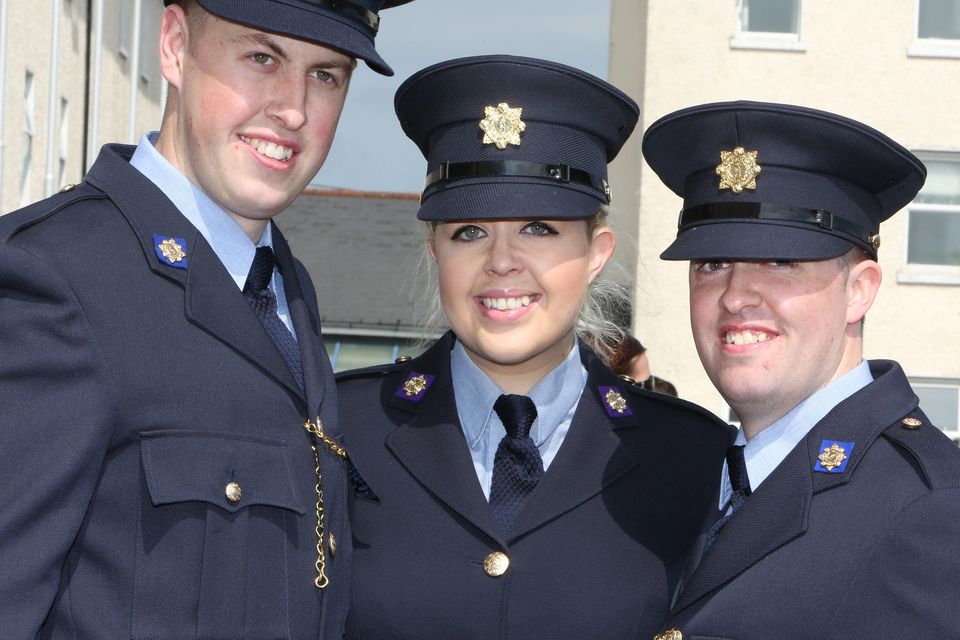 Jennifer Bell with her brothers Joseph and Brian from Lucan, Dublin, at the Garda graduations in Templemore yesterday.
Photo: Liam Burke/Press 22