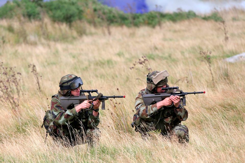 Members of the Defence Forces return fire during a simulated ambush pictured during intense training in preparation for their forthcoming deployment to the United Nations Disengagement Observation Force, (UNDOF) based in the Golan Heights region of Syria. Picture Colin Keegan, Collins Dublin.