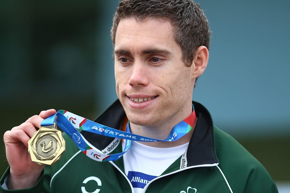 Jason Smyth with his gold medal after winning the mens 200m at the IPC Athletics European Championships