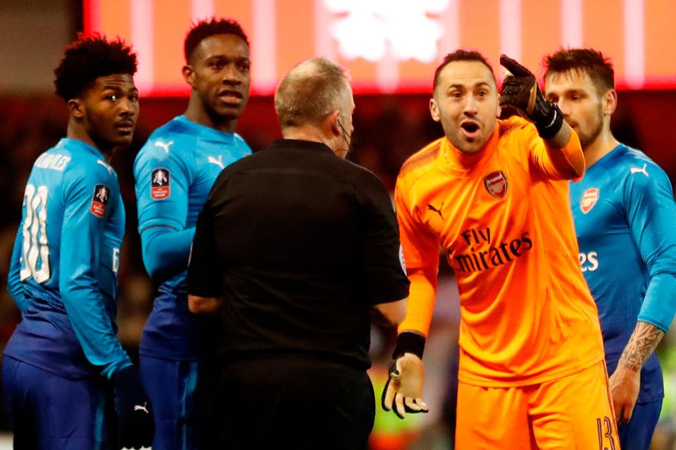 David Ospina leads the Arsenal protests to referee Jon Moss after
Nottingham Forest’s fourth goal. Photo: Action Images via Reuters/Carl Recine