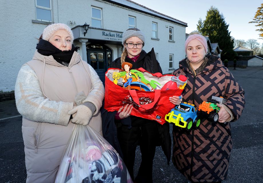Local women Ebony Doherty with Rodika Kennedy and Sarah Kennedy pictured with bags of toys and clothes for asylum seeker children staying at Racket Hall in Roscrea, Co Tipperary. Photo: Frank McGrath