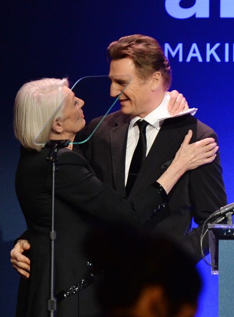 Vanessa Redgrave and Liam Neeson speak onstage during the 2014 amfAR New York Gala at Cipriani Wall Street on February 5, 2014 in New York City.  (Photo by Larry Busacca/Getty Images)