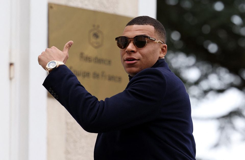 France's forward Kylian Mbappe arrives in Clairefontaine-en-Yvelines as part of the team's preparation for upcoming UEFA Euro 2024 qualifying matches.